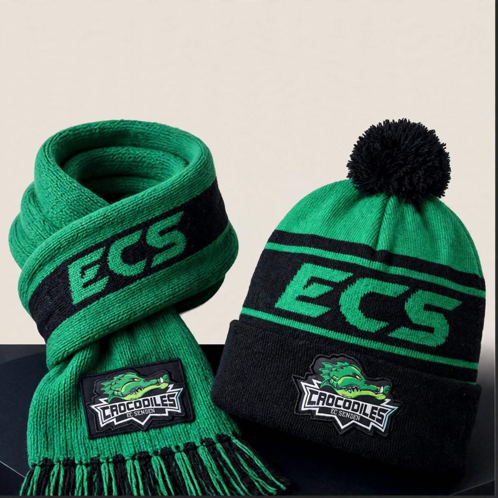 ECS Crocodiles için üretilen yeşil-siyah jakarlı bere ve atkı seti